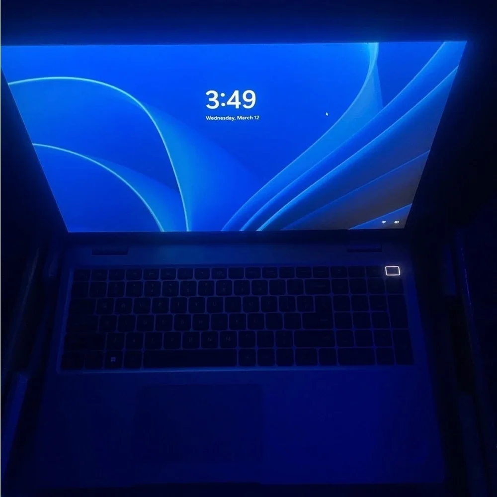 Dell Gray Laptop with Blue Display